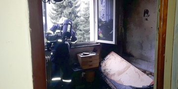 Požár v bytovém domě